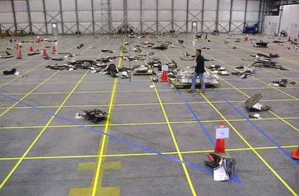 Above: A member of the space shuttle Columbia reconstruction project team 